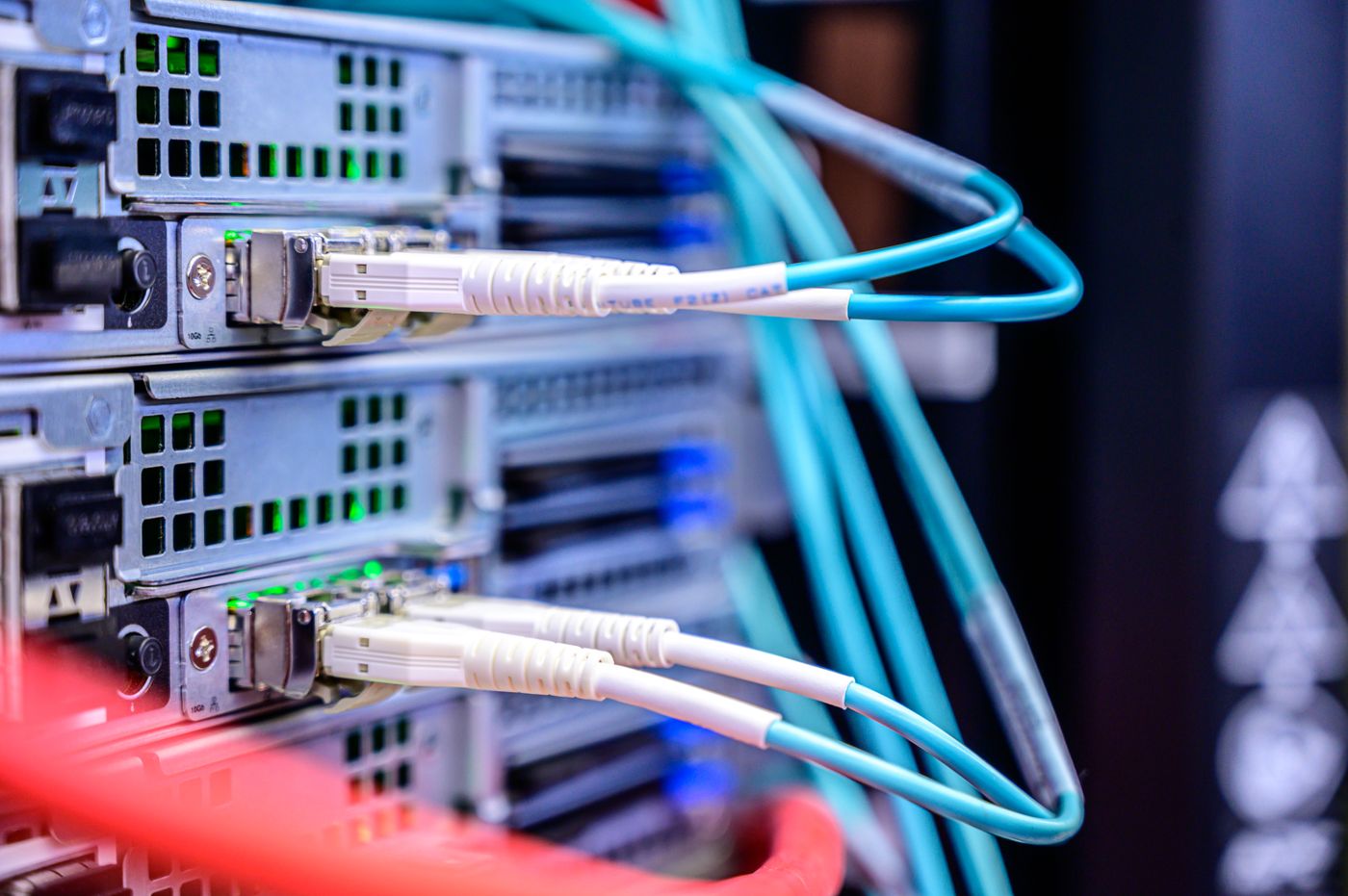 Fiber optic patch cords terminated into a commercial network switch in a structured cabling installation
